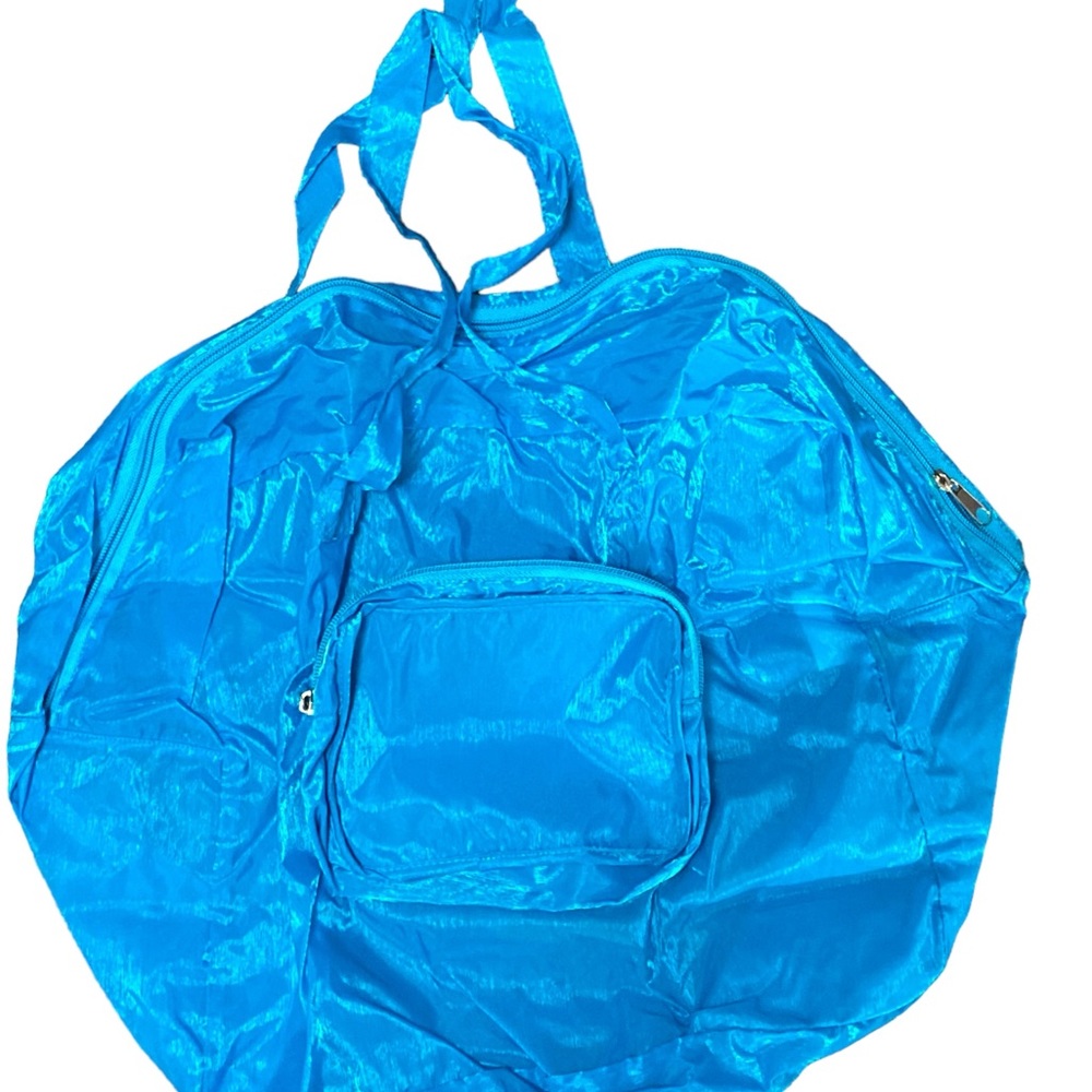 Peter Pan Collapsible zippered nylon tote in blue. NWOT